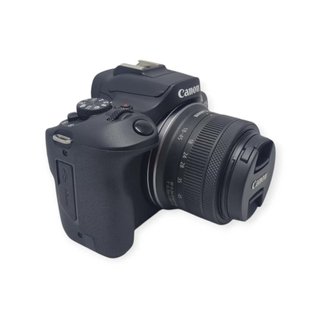 CAMARA DE FOTOS CANON EOS R100 + OBJETIVO 18-45MM + CARGADOR
