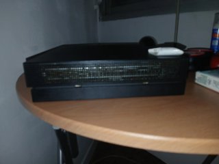Xbox One X Negra + 2 Mandos el mando rojo es pract
