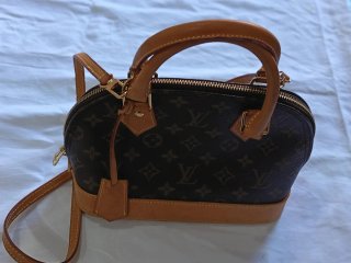Bolso Louis Vuitton Marrón y Dorado