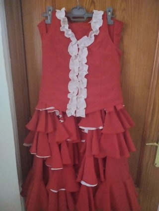 Traje de flamenca rosa con lunares