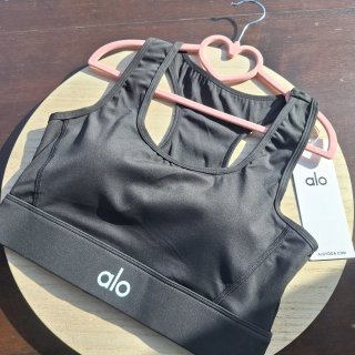 Top sportivo Alo Yoga nero Taglia L