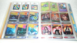 Álbum de cromos Invizimals y cromos wwe