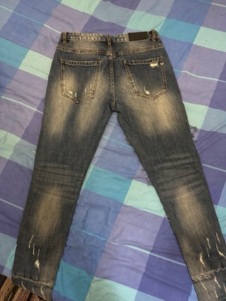Pantalón vaquero AMICCI azul con tiras blancas