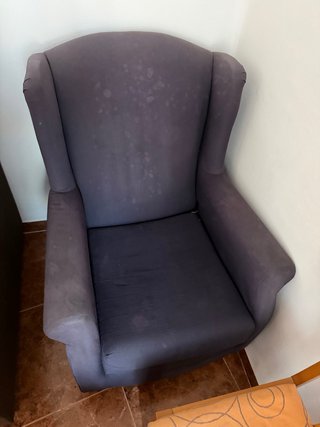 Sillón de tela gris
