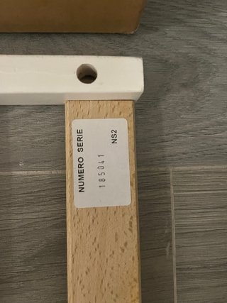 Cuna blanca con ruedas