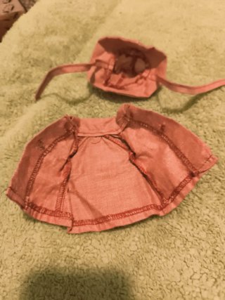 Mariquita Pérez: Gabardina y sombrero