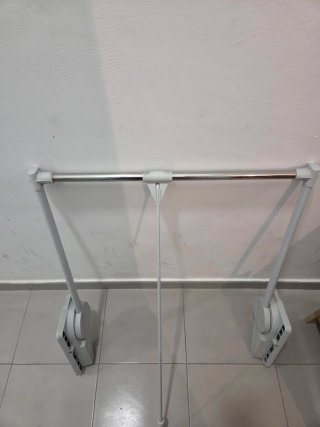 Perchero basculante para armario