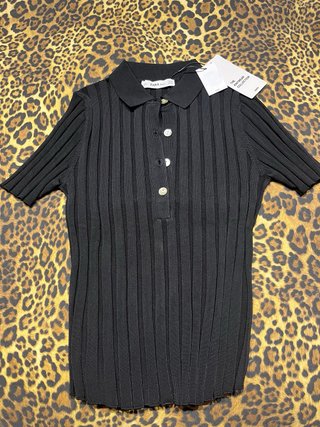 Polo punto Zara negro