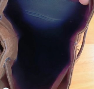 Mochila marrón con flecos