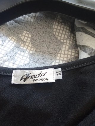 Canotta lunga nera con tasche e paillettes
