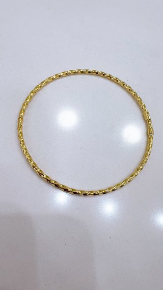 Bracciale rigido intrecciato in oro 18kt 750