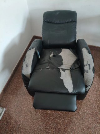 Sillón de masaje negro y gris