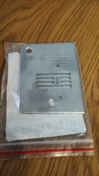Placa para máquina de coser