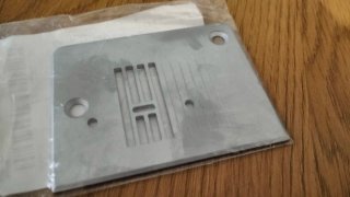 Placa para máquina de coser