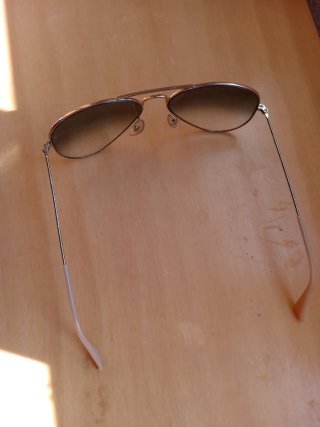 Gafas de sol aviador doradas y marrones