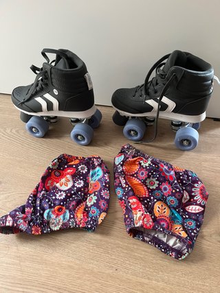 Patines 4 ruedas niño/a negros. Talla 35