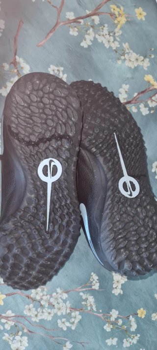 Zapatillas de fútbol Nike negras y azules