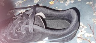 Zapatillas de fútbol Nike negras y azules