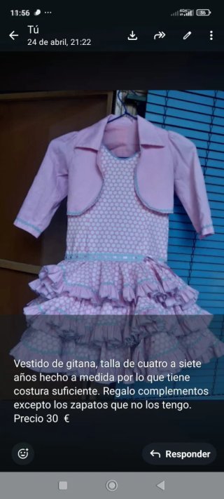 Traje de flamenca rosa con volantes