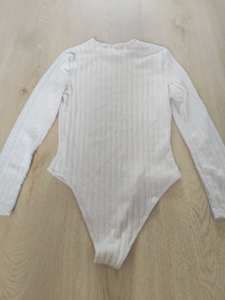 Body de niña beige