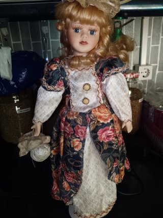 Muñeca de porcelana vintage