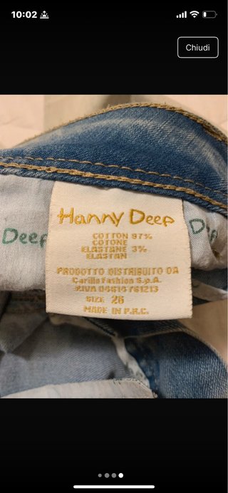 Jeans azzurro sfumato  con perle
