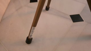 Silla bastón plegable negra y dorada