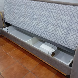 Sofá cama color gris en tela