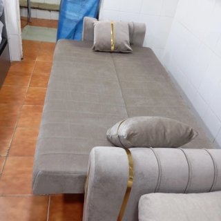 Sofá cama color gris en tela