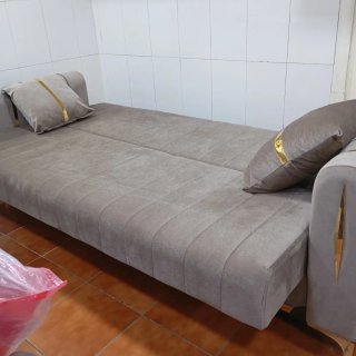 Sofá cama color gris en tela