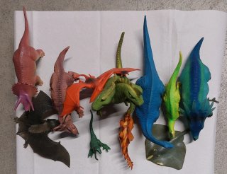 11 Dinosauri Giocattolo Assortiti