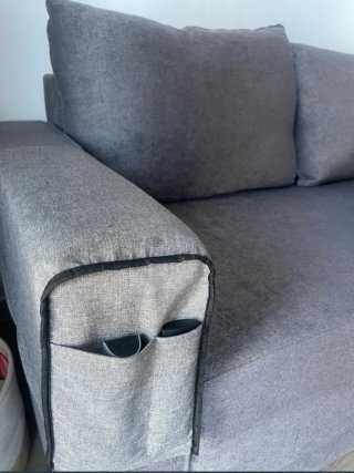 Sofá cama gris de tela