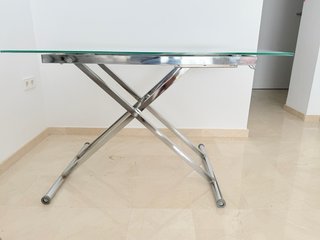 Mesa de centro elevable de cristal y acero inox