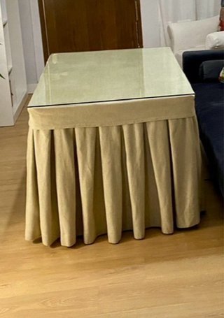 Mesa de centro elevable de cristal y acero inox