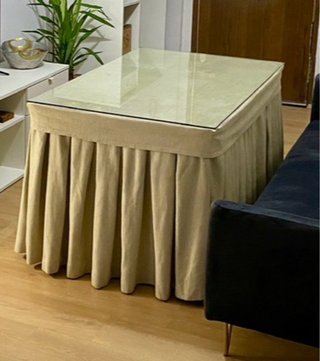 Mesa de centro elevable de cristal y acero inox