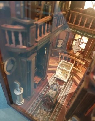 Casa de muñecas booknook soggetto libri montato