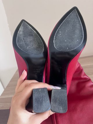 Botas altas con tacón rojo
