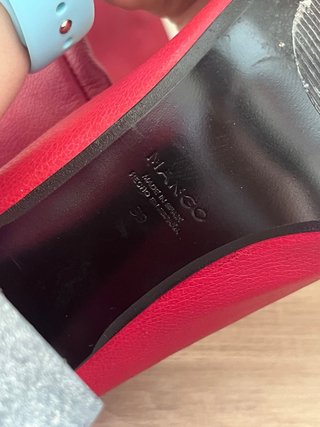 Botas altas con tacón rojo