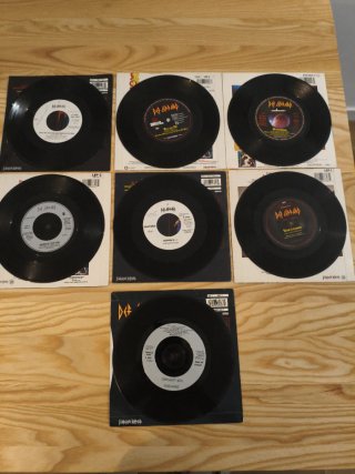 LOTE 7 SINGLES DEF LEPPARD UK VINILOS IMPORTACION