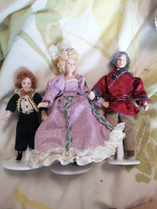 Familia de muñecas casa miniatura