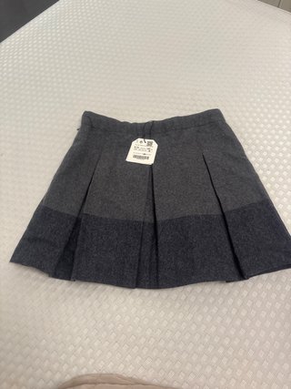 Falda niña gris con vuelo 9-10