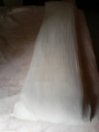 Almohada de tela blanca