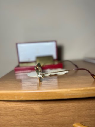 Occhiali Cartier oro e vetri verdi rubino