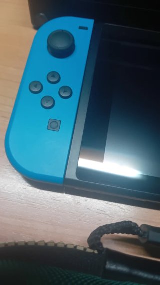 COMO NUEVA Nintendo Switch+ funda
