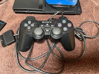 Playstation 2 Negra con Accesorios