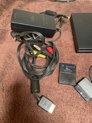 Playstation 2 Negra con Accesorios