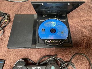 Playstation 2 Negra con Accesorios