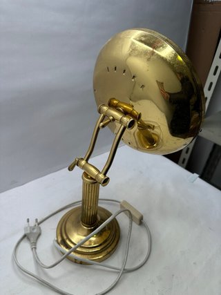Lampada da tavolo dorata con filo