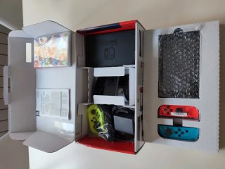 Nintendo Switch + Juegos y Accesorios