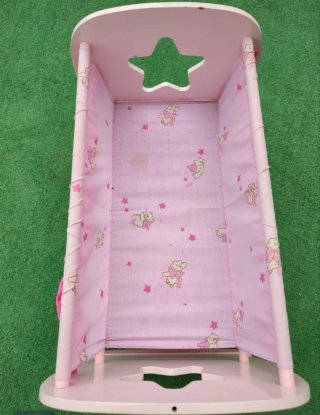 Cuna de juguete rosa con ositos